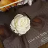Beige crab pin, flowered