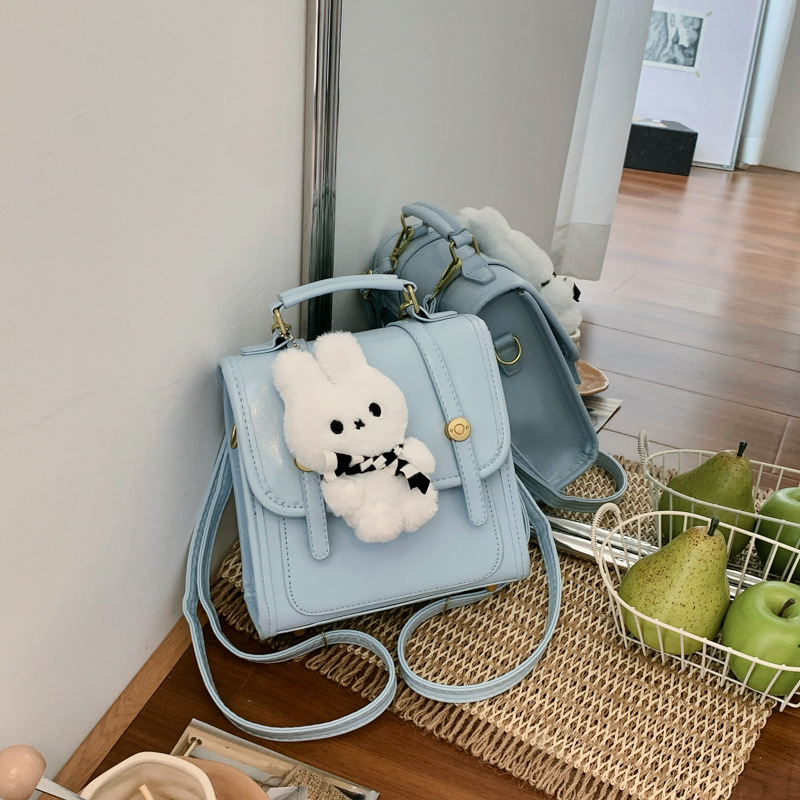 Cantos colgantes de dibujos animados de hombro pequeño bolso de mujer de verano estilo coreano nicho color sólido mochila mujer