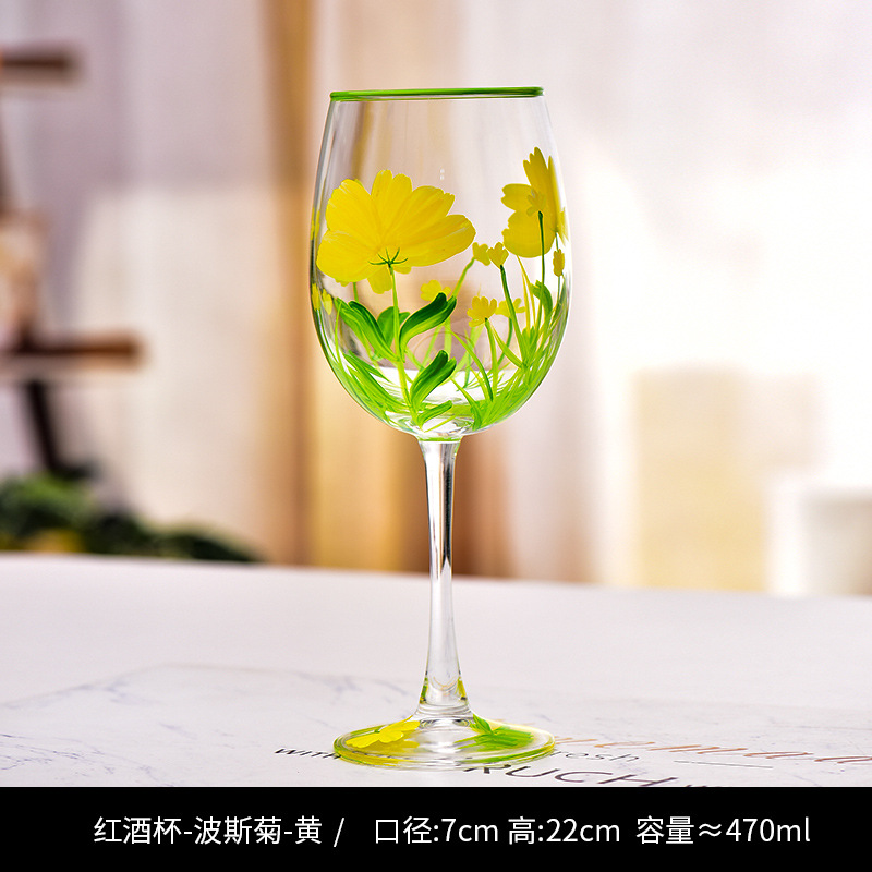 Vaso de vino tinto amarillo cosmos pintado a mano