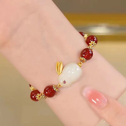 New style national trend and Hetian jade Fu fortune rabbit bracelet for girls, ancient style zodiac rabbit, popular hand tie with red bean agate.