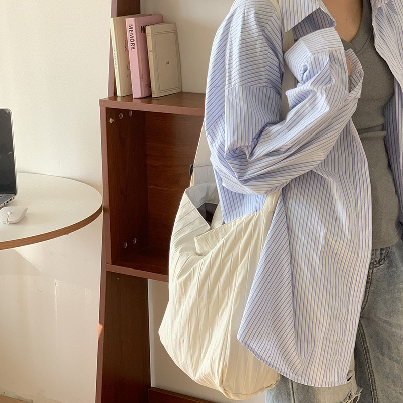 Bolsos de cubo de agua bolsos de mujer nueva textura simple bolsos de transporte de gran capacidad bolsos de hombro bolsos