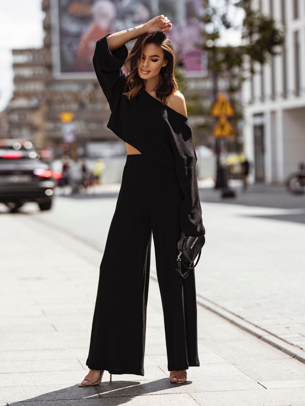 Model walking in outfit