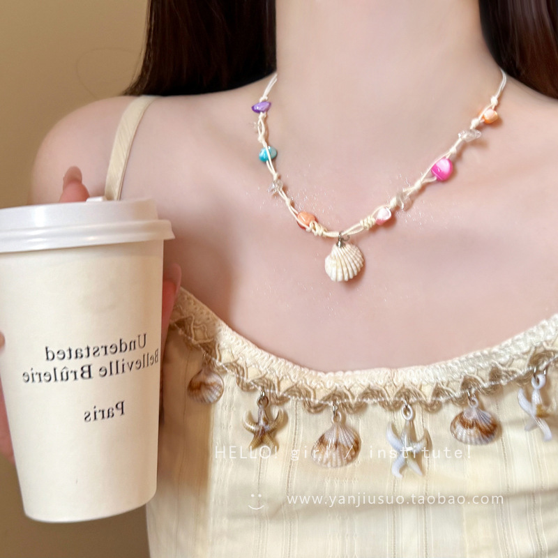 Cuerda de cera estrella de mar concha colgante de perlas collar vacaciones de verano estilo cadena de clavícula cadena de suéter de moda fresca y dulce mujer