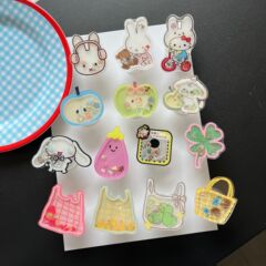 漫画ロッキングマグセーフ磁気吸引スタンド超萌え伸縮携帯電話エアバッグスタンド携帯用アイデア