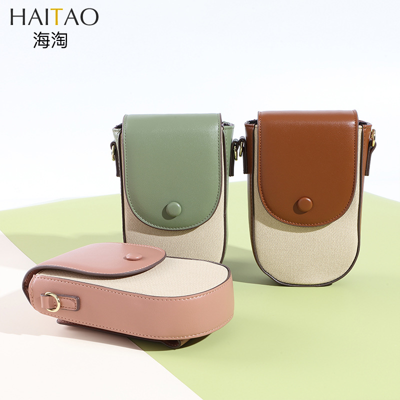 Bolso bandolera Mujer Versión coreana de la moda patrón de lona Versión vertical de la bolsa de teléfono móvil con múltiples tarjetas Versión coreana simple Bolso diagonal de un solo hombro al por mayor