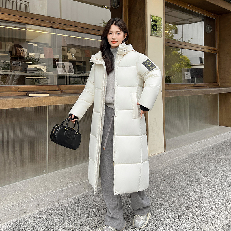 Invierno de mujer 2024 nueva moda coreana encapuchada estilo académico engrosado suelto chaqueta larga sobre la rodilla image 1