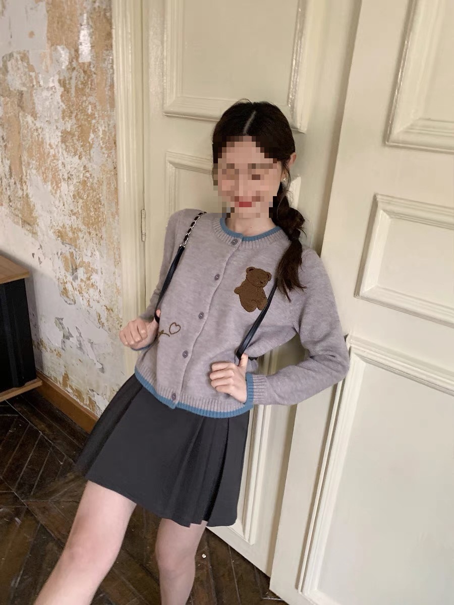 Cute autumn cardigan with a round collar