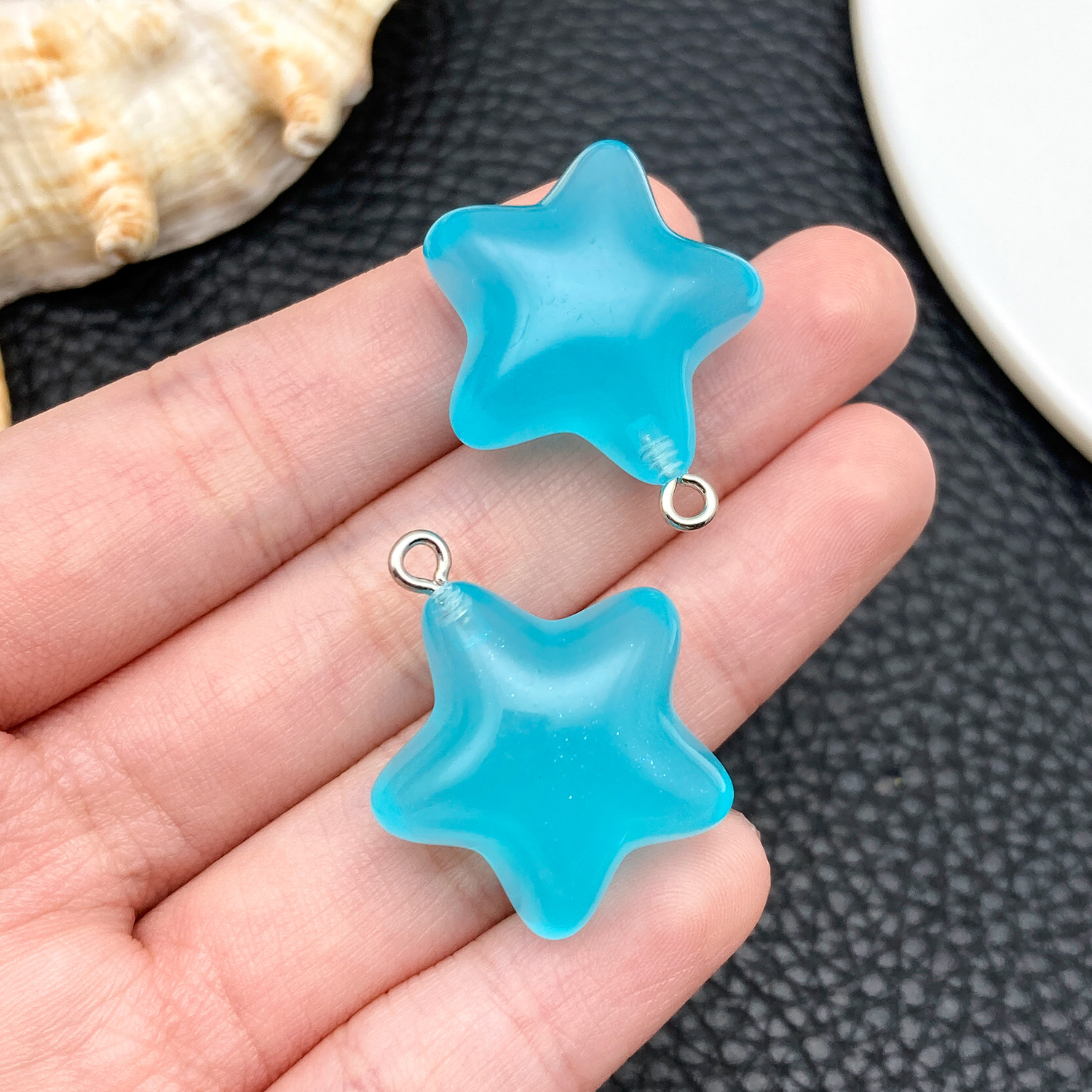 24065-H-紫色树脂夜光星星27x23x13mm-3.5