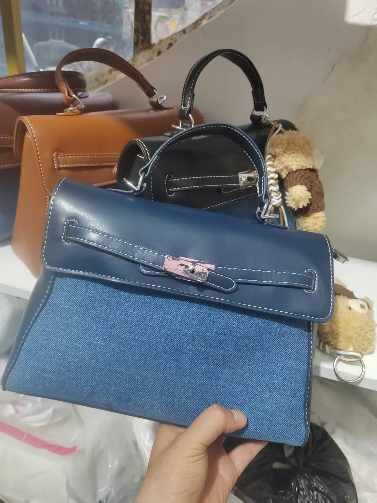 Jeans portátil de alto nivel, bolsos de Kelly, mujeres de moda coreana transfronteriza, nicho de alto nivel, bolsos de hombro de un solo hombro