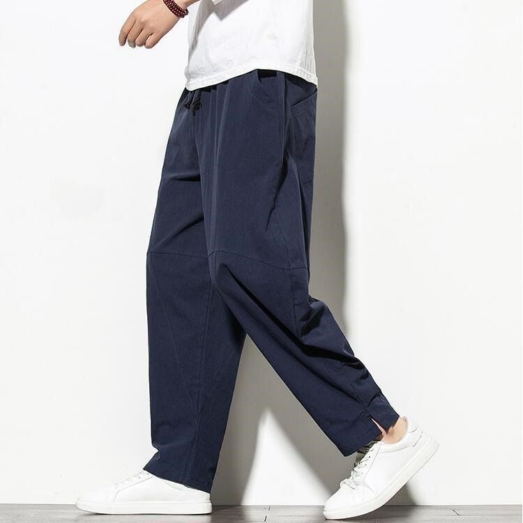 Pantalones de hombre de estilo chino pantalones de lino sueltos casuales primavera y verano pantalones harem de pierna ancha de lino de algodón recto fino linterna