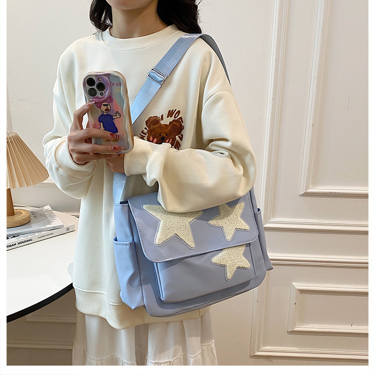 Cross-border wholesale large-capacity five-pointed star canvas single-shoulder bag, cute school style crossbody bag, student commuting bag for classes Item Picture