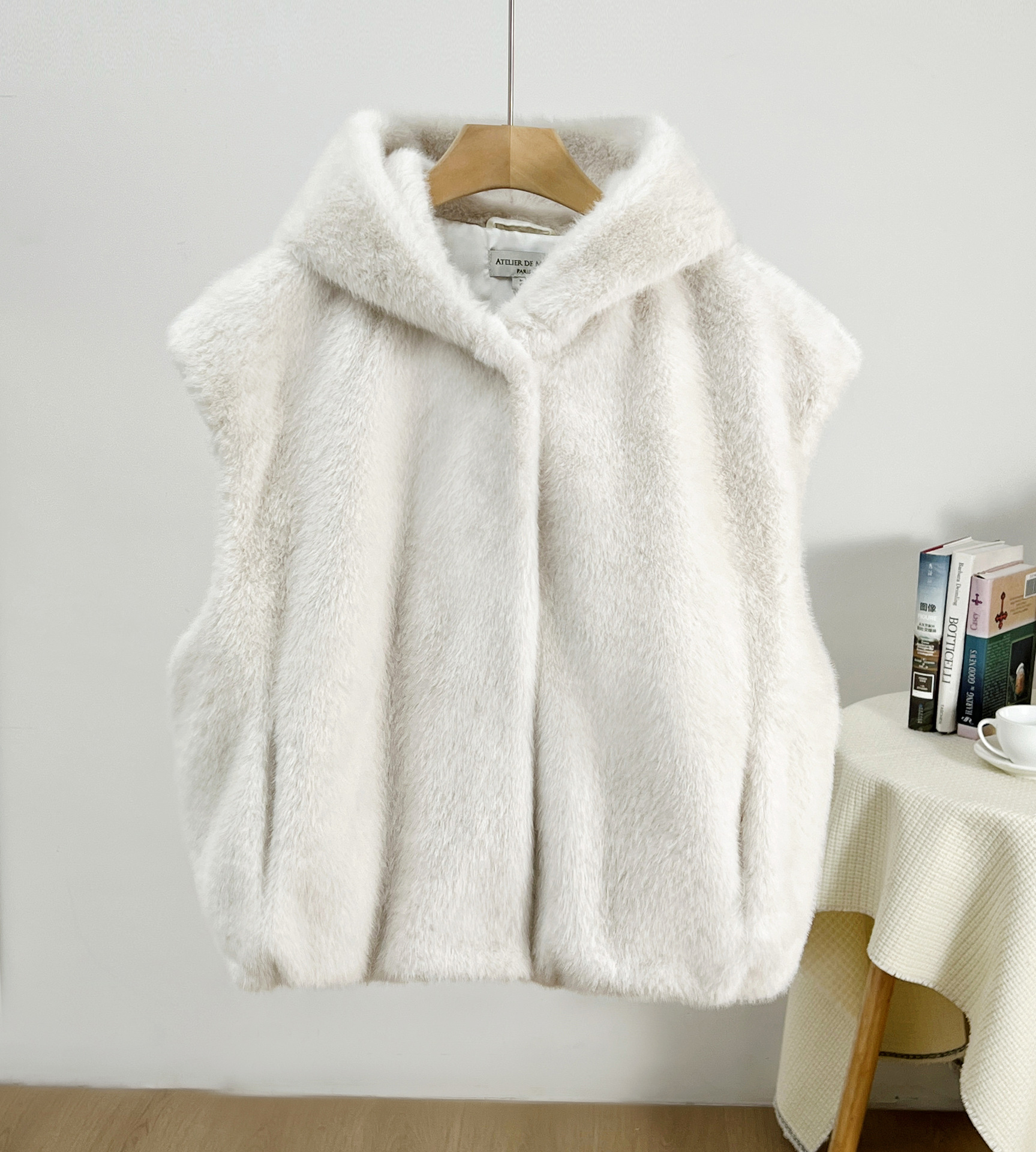 Primavera nuevo chaleco con capuzas de imitación de chaleco de botón una chaqueta de moda al por mayor corta