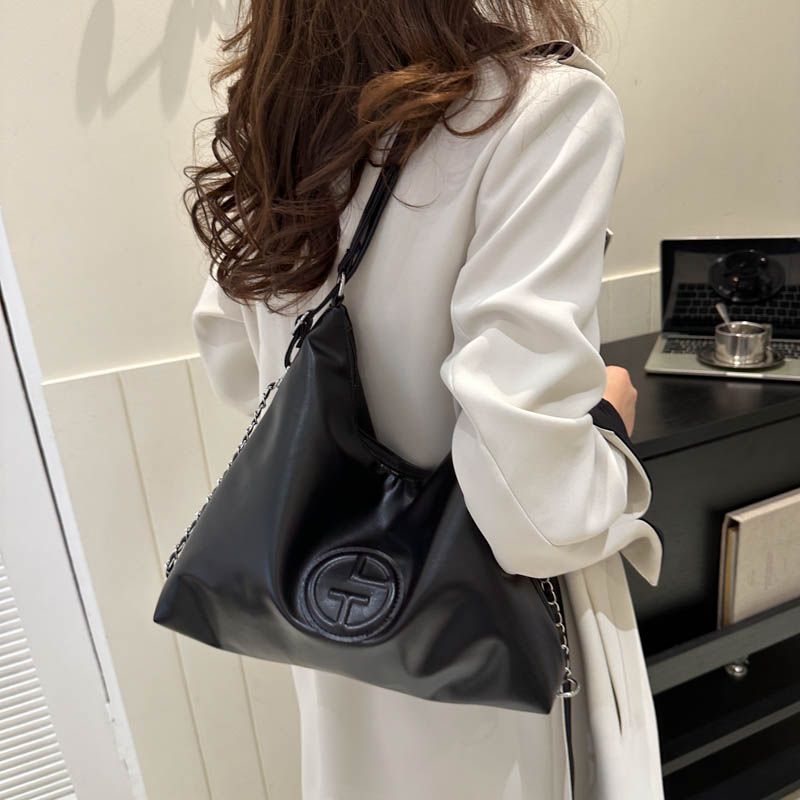 Bolso de mano de gran capacidad de alta calidad de la cadena de cuero suave nicho diseño mochila moda hombro bolsa de mensajero de la manera