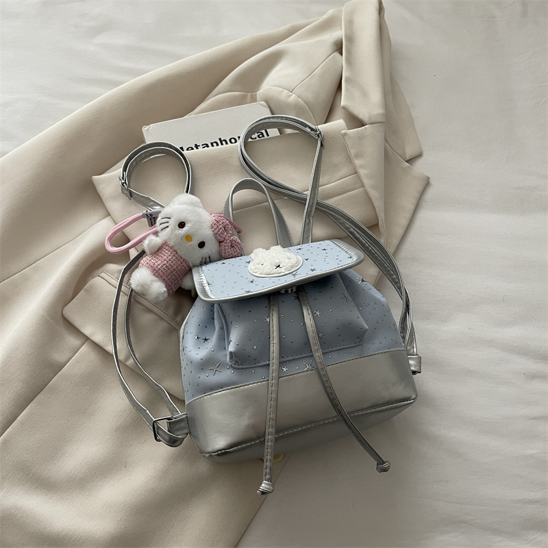 Mochila de moda coreana encantadora nicho femenino diario dulce estrella ondulado punto mochila de estudiantes mochila universal