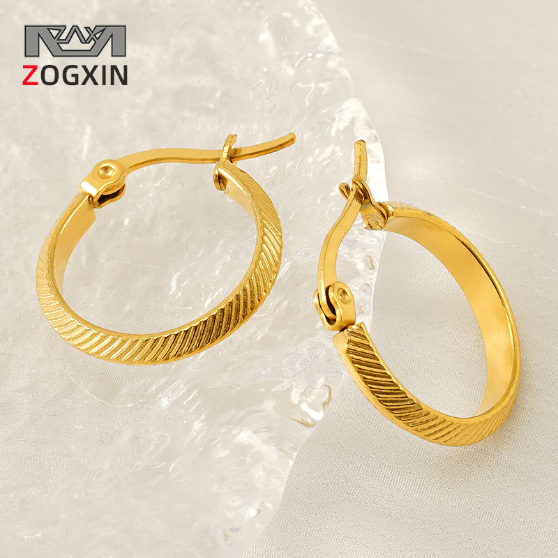 Pendientes redondos de acero de titanio transfronterizo europeo y americano Pendientes de viento de lujo ligero geométrico para mujer Pendientes de círculo a rayas de acero inoxidable de 18K para mujer