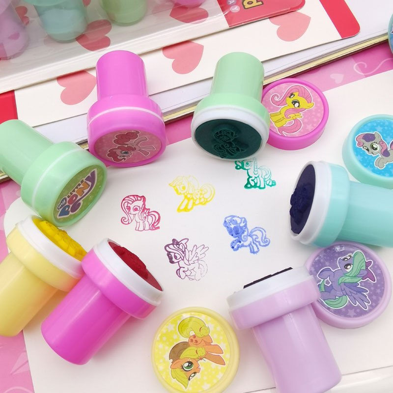 Pony Boley sellos de niños recompensas cuentas de mano juguetes dibujos animados lindos corazón de una niña púrpura sello Pony papelería.