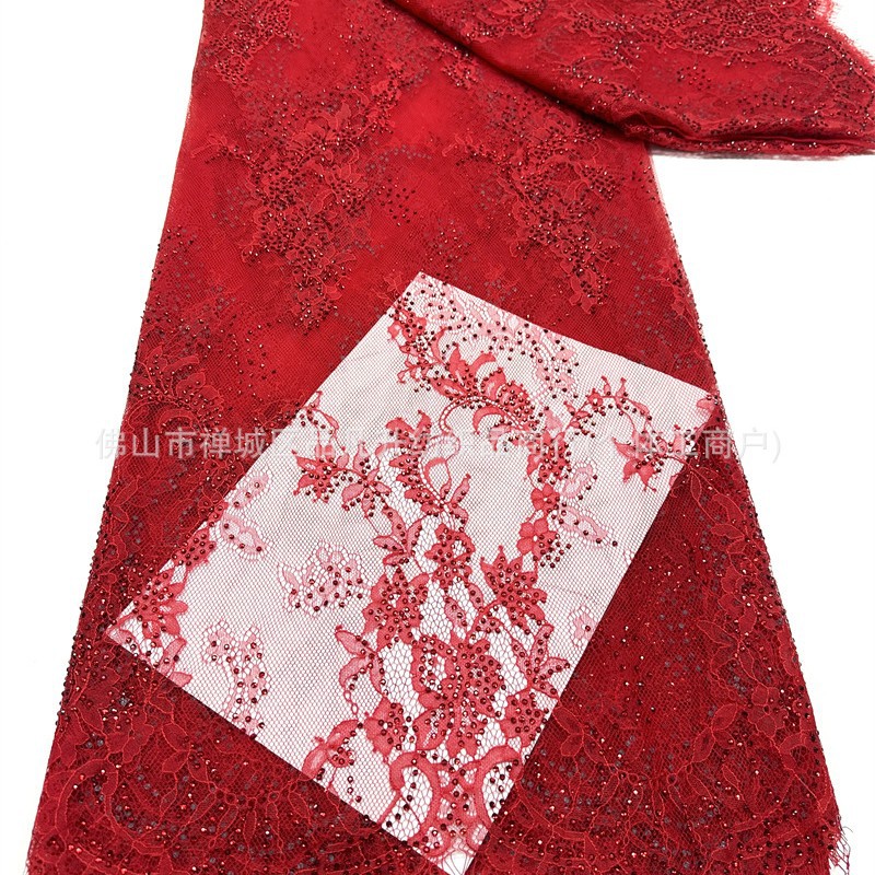 Tejido de malla de pestañas de encaje caliente flor retro hecha a mano verde diamante de cola de pez vestido de noche tela de boda en stock