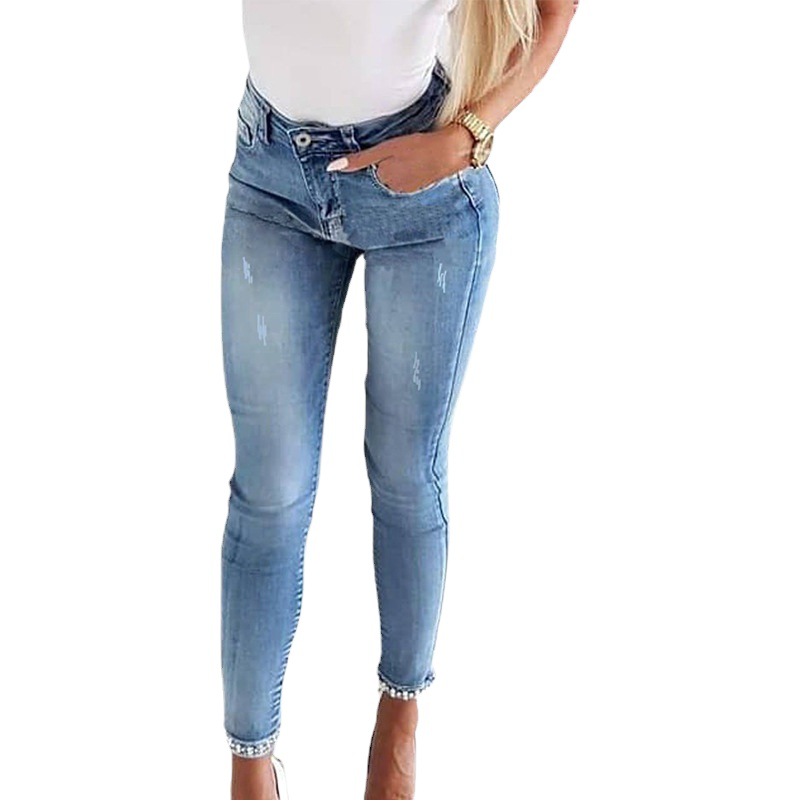 Venta directa de fábrica, vaqueros ajustados europeos y americanos transfronterizos para mujer, pantalones pitillo con abertura y cuentas de flores adhesivas de mariposa adelgazantes para pies pequeños