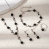E4426 four-piece set with silver and black flowers