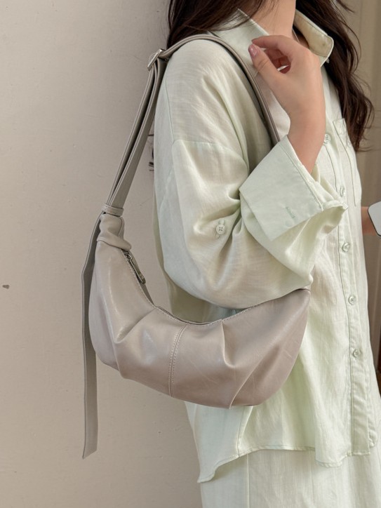 Casual bolso de bollo de bollo de gran capacidad para mujeres 2026 nuevo estilo coreano de nicho de moda universal bolso de hombro