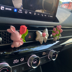 花を抱いてウサギの車のアロマの高級感を抱いて香ばしい石の置物の風口を広げて車のアロマの花の車内の装飾品を飾ります。
