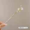 Необычная шпилька с двумя бусинами — золото