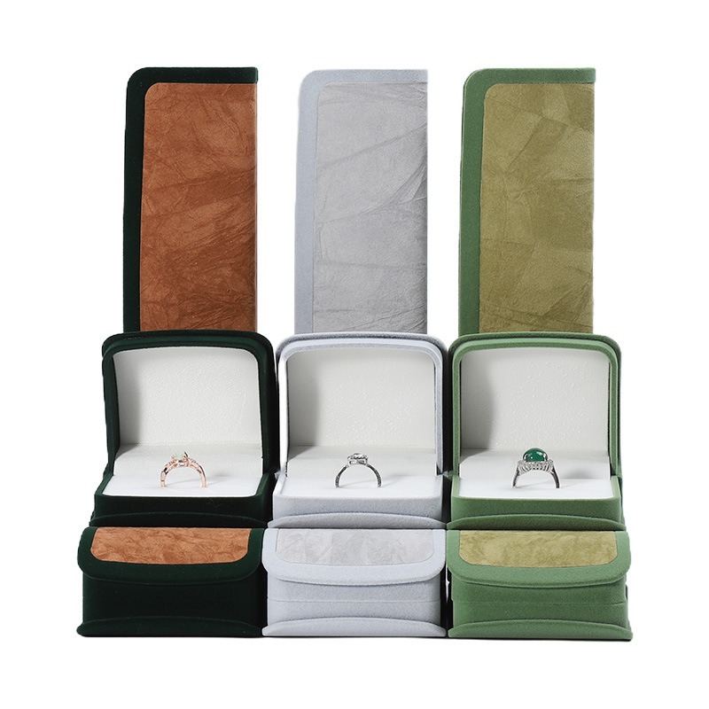 Caja de joyería de doble color arco flocado caja de collar de anillo sensación alta caja de almacenamiento de pernos caja de embalaje de joyería