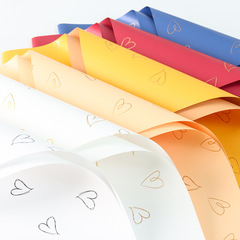 Flower wrapping paper Yiwu factory wholesale rose bouquet wrapping paper two-color Ouya paper sweetheart waterproof paper