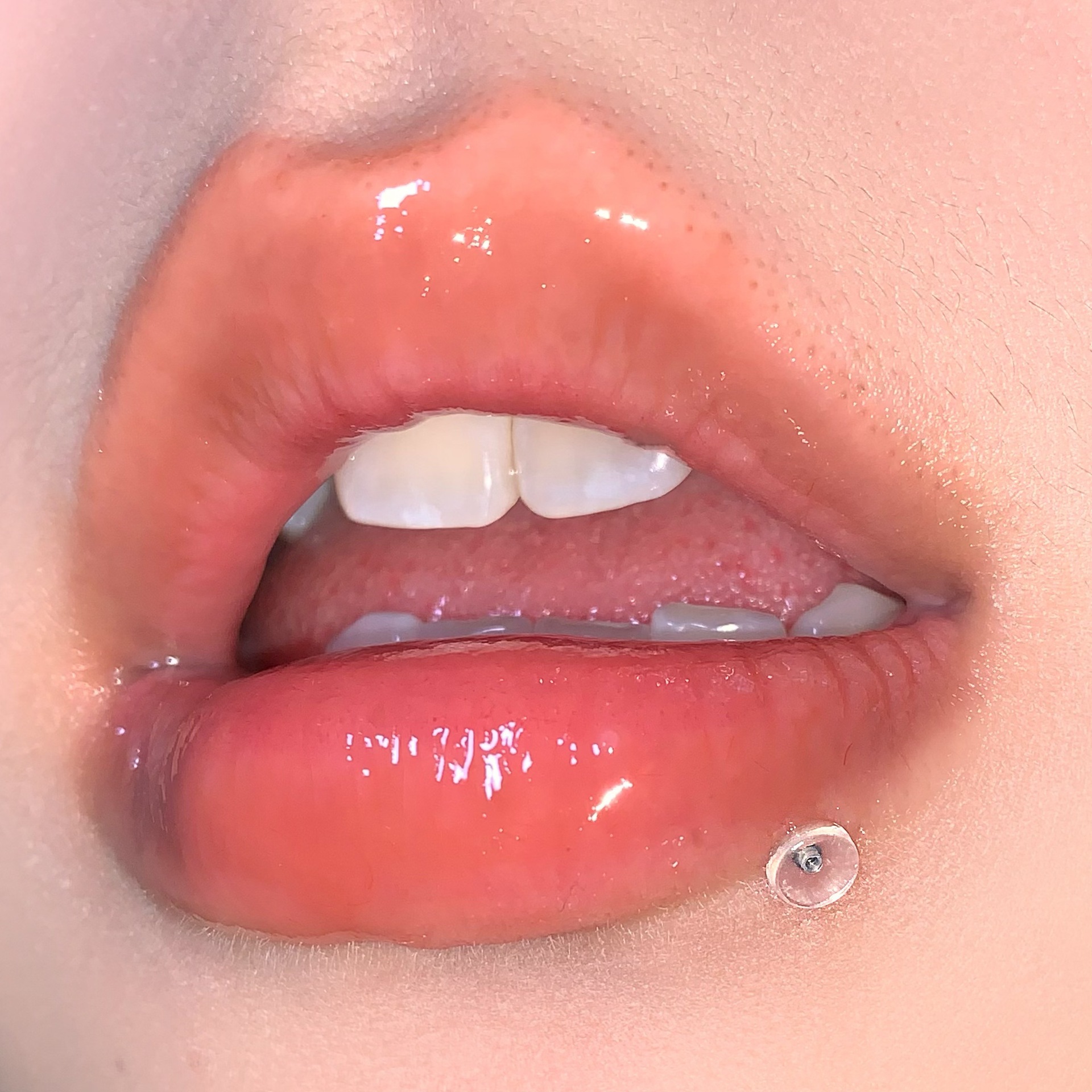Silver pointed spike labret stud material detail