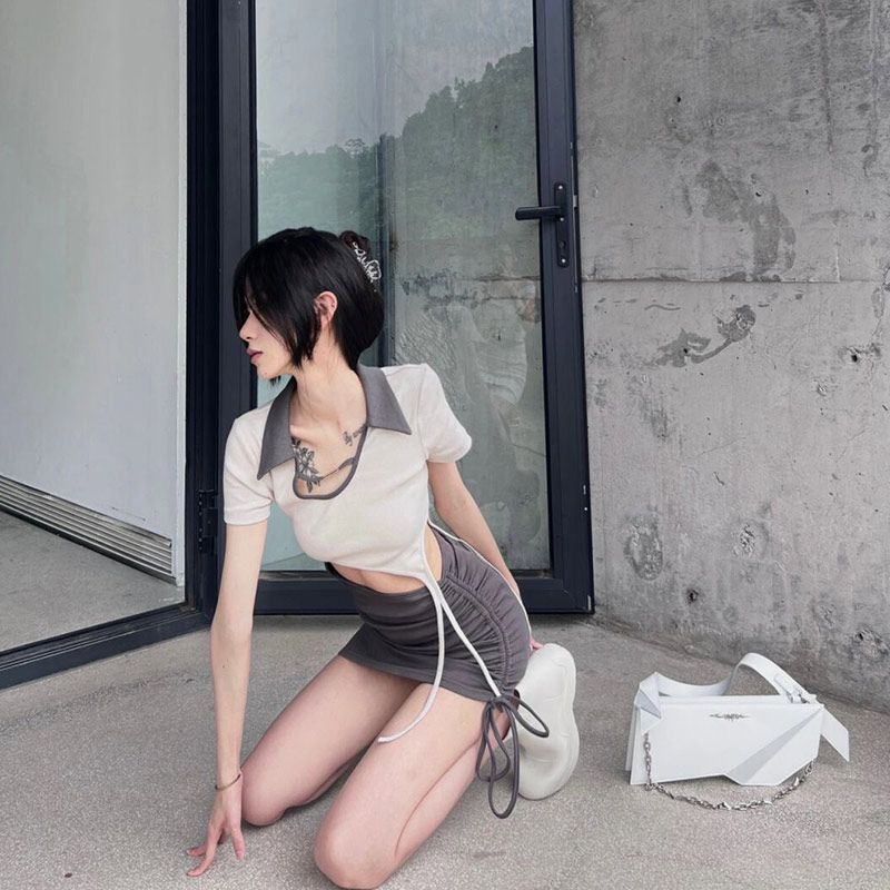 Contrasting color splicing hollow design sense Thai temperament slim and sweet hot girl chic retro sexy hip-pack dress for women