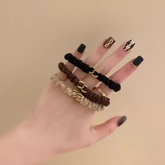 小衆の高級感の基礎のヘアリングは黒色のゴムの小腸の輪の高弾力を合わせて髪のひもの飾りの女性を傷つけません。