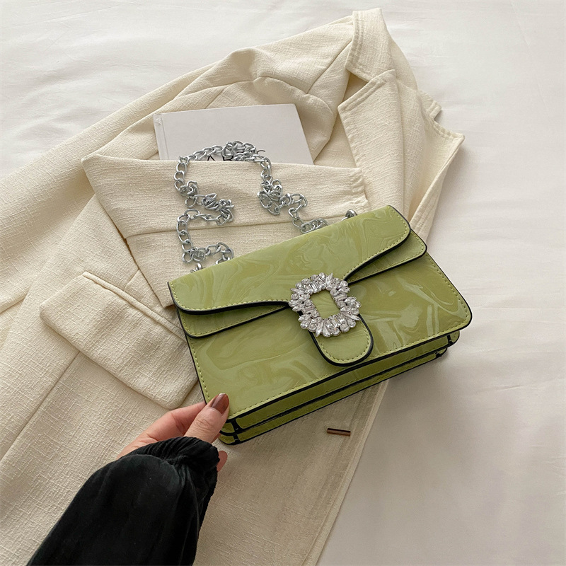 Moda simple temperamento coreano cadena de hombro bolso de mochila para mujeres 2024 primavera nueva bolsa de diamantes de estilo extranjero