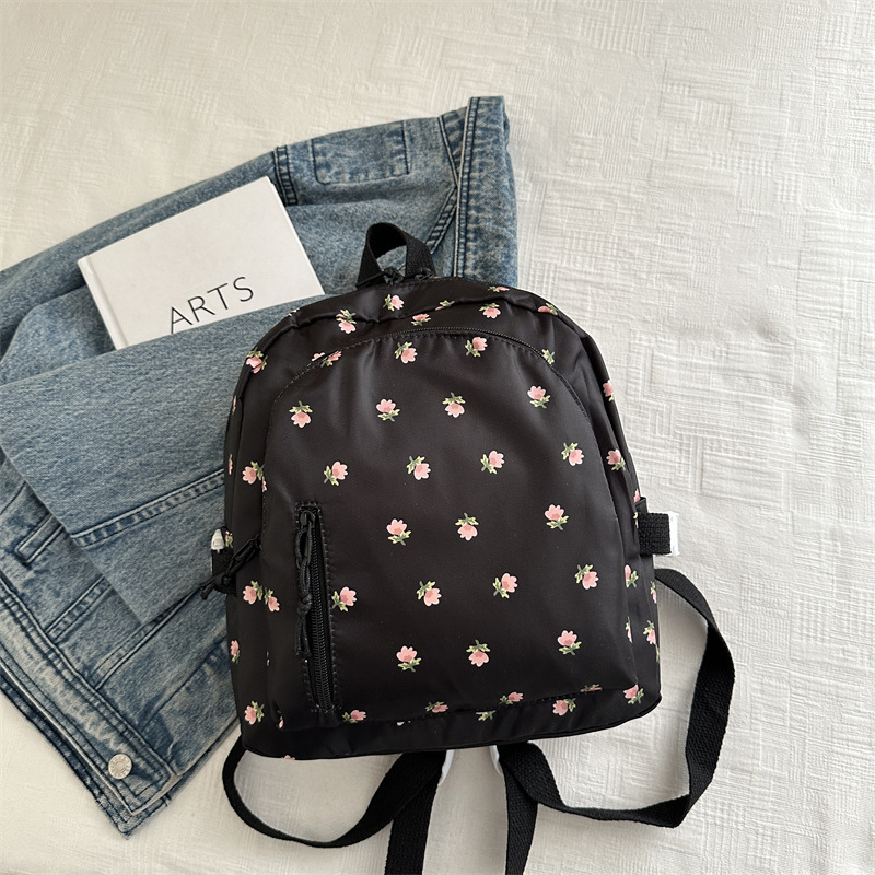 2025 primavera nueva moda coreana simple mochila de hombro casuales flores frescas lindas dulces mochila de estudiantes