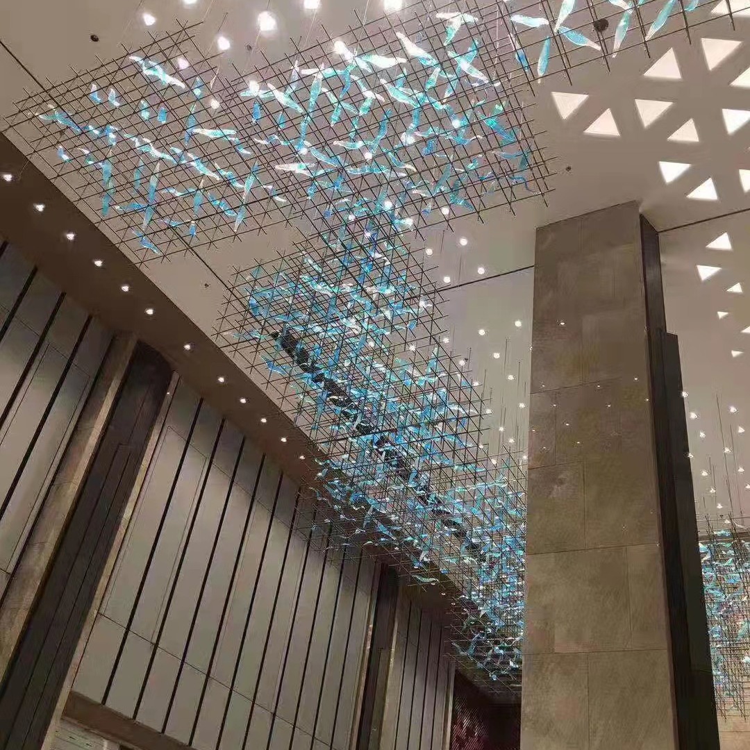 Lámpara de hotel a gran escala, araña de cristal personalizada, lámpara de cristal artesanal, lámpara de cristal en forma de pez, lámpara de Zhongshan, araña grande