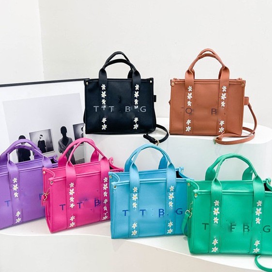 Bolsos de mujer portátiles de gran capacidad 2025 primavera y verano nueva moda todo-fósforo bolso de mensajero de alta calidad