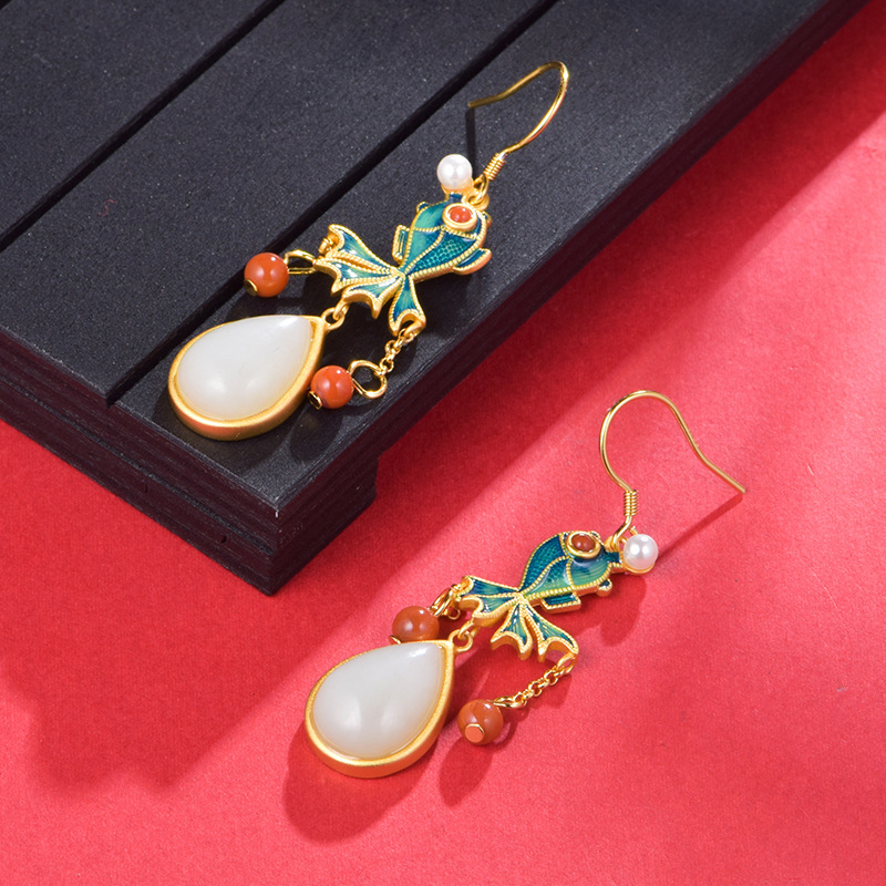 Design elegant earrings from Khotan district white jade