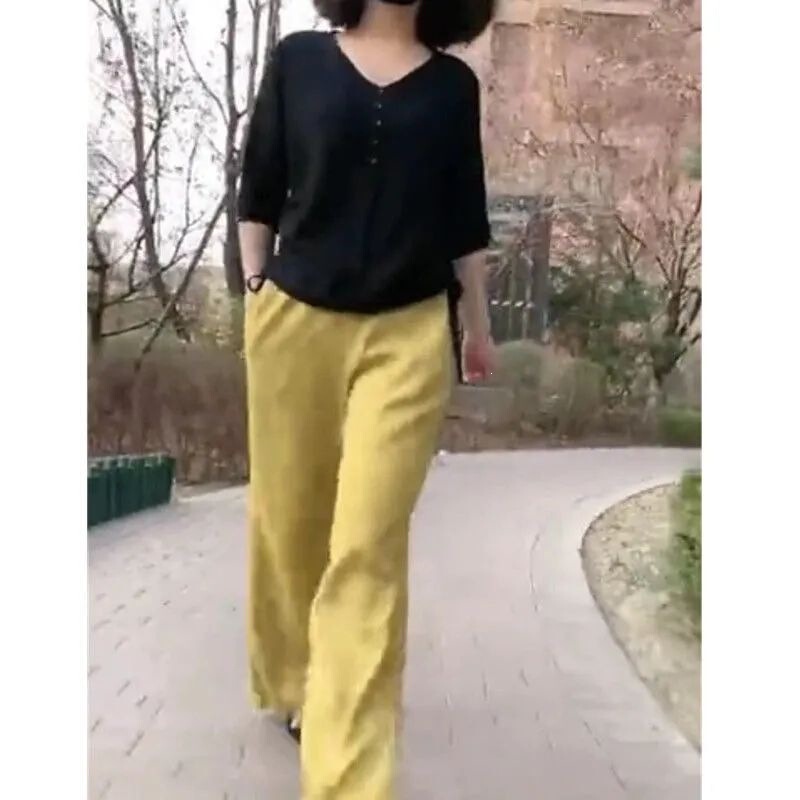 2026 Spring and Summer New Style Casual Suit for Women, Black Bottoming Shirt, Yellow Wide-Leg Pants, Fashionable and Slimming Two-Piece Set 2026 Spring and Summer New Style Casual Suit for Women, Black Bottoming Shirt, Yellow Wide-Leg Pants, Fashionable and Slimming Two-Piece Set