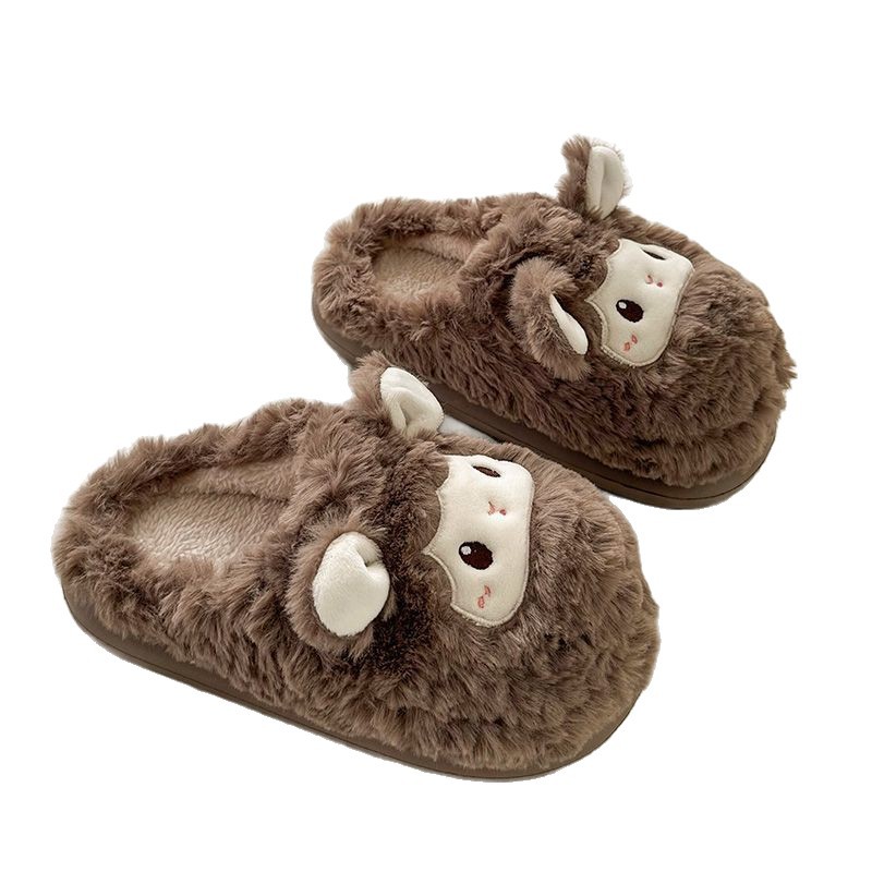 Hermosas zapatillas de algodón de oveja casera pareja de cabeza caliente antideslizante fondo grueso pisar mierda sensación de invierno peludo zapatillas