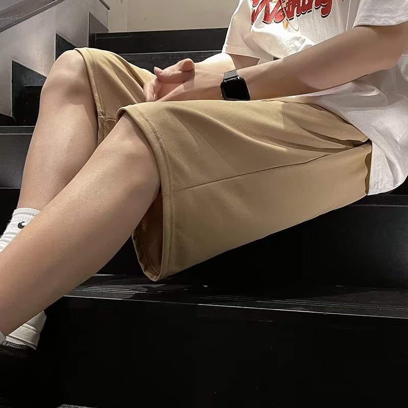 Marca de moda ins pantalones cortos casuales de verano para hombres estilo caliente holgado tendencia casual ropa exterior pantalones de cinco puntos de estilo coreano de todo fósforo