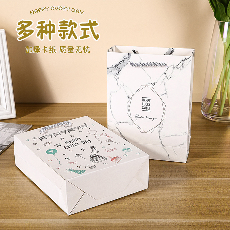 En stock al por mayor bolsa de regalo de ropa cartón blanco cumpleaños bolsa de regalo de mármol bolso de papel de compras de Navidad