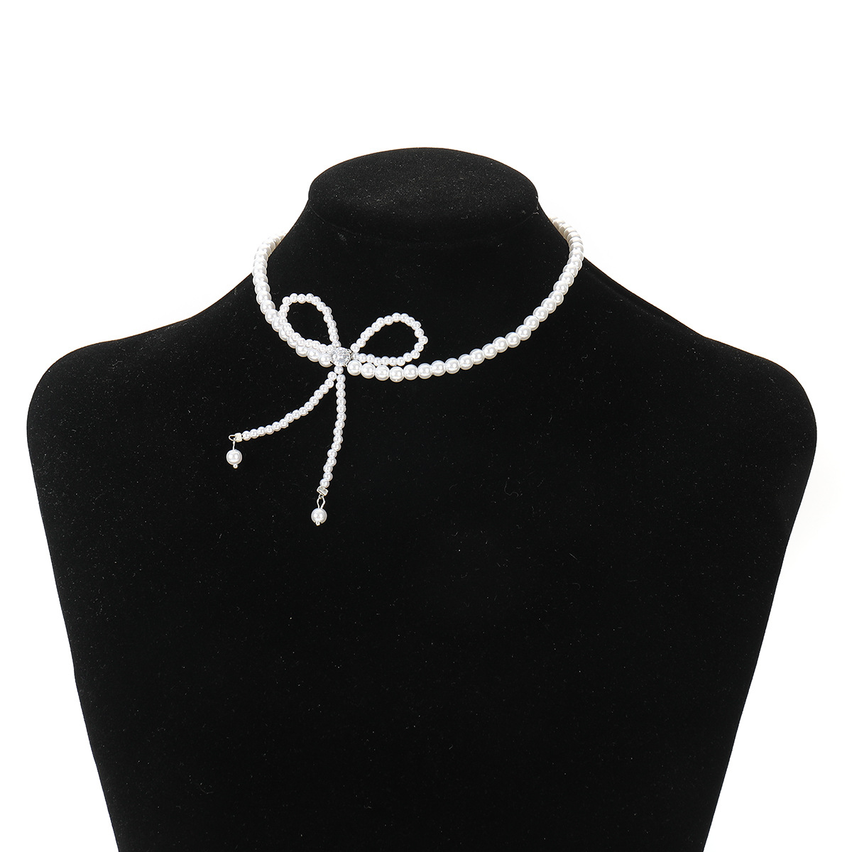 Colar longo elegante com borlas de pérolas laço e diamante_voghion.com