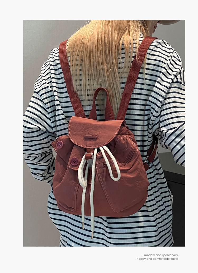 Colorful Fox's new Korean-style ins women's niche design lightweight pocket button drawstring backpack undefined