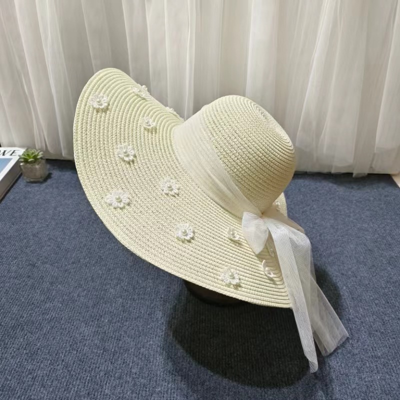 Women's Cute Sweet Simple Style Flower Embroidery Pearl Wide Eaves Straw Hat display picture 5