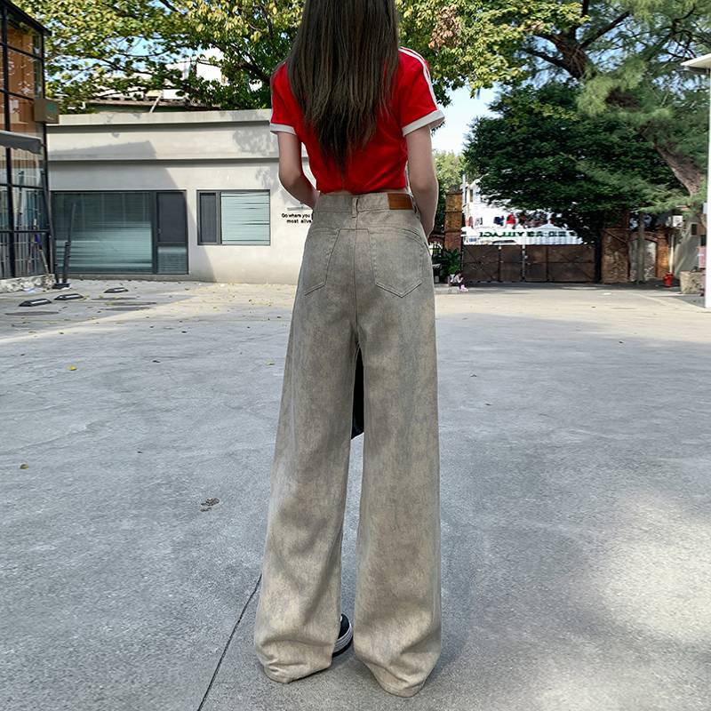 卸売りのレトロな廃土風は広い足のジーパンの女性の春夏のゆったりしているカジュアルなストレートズボンを染めます。|undefined