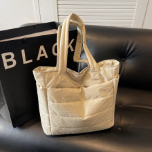 原创小众羽绒包女2024新款潮大容量布包手提通勤包百搭托特包