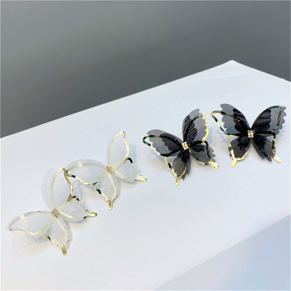 Fashion Hollow Butterfly Diamond-studded Earrings display picture 7