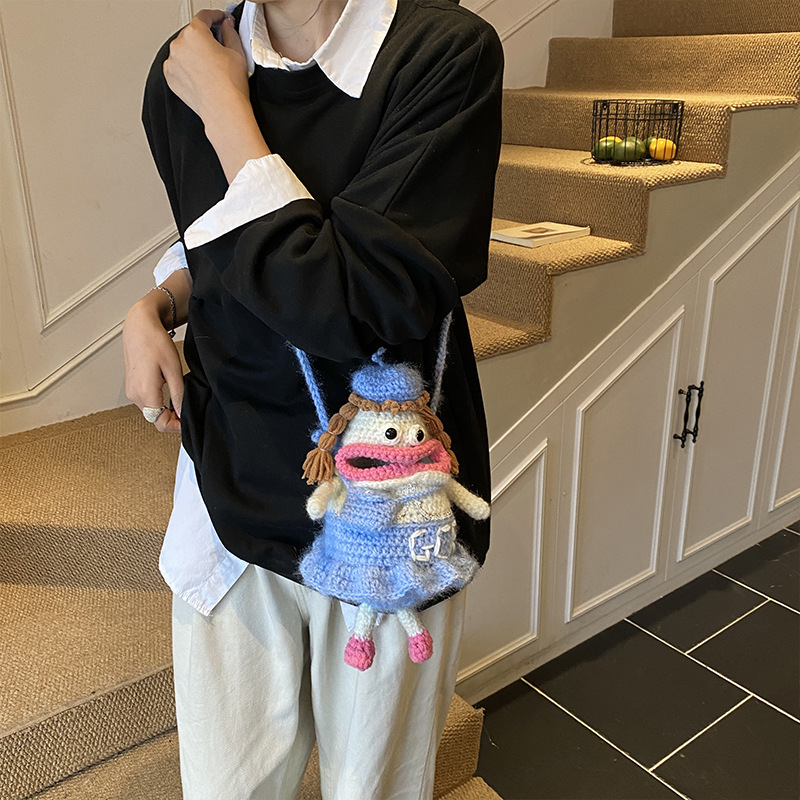Otoño y invierno nuevo gancho de lana bolsas de niños divertidas extrañas bolsas de accesorios para bebés caricaturas bolsas de cambio para niños y niñas