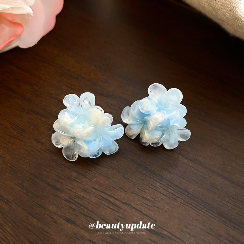 Pendientes de flores de súper hadas manchadas con agujas de plata Pendientes de todo fósforo de moda Personalidad femenina Pendientes de temperamento de lujo ligero Sensación de clase alta de nicho