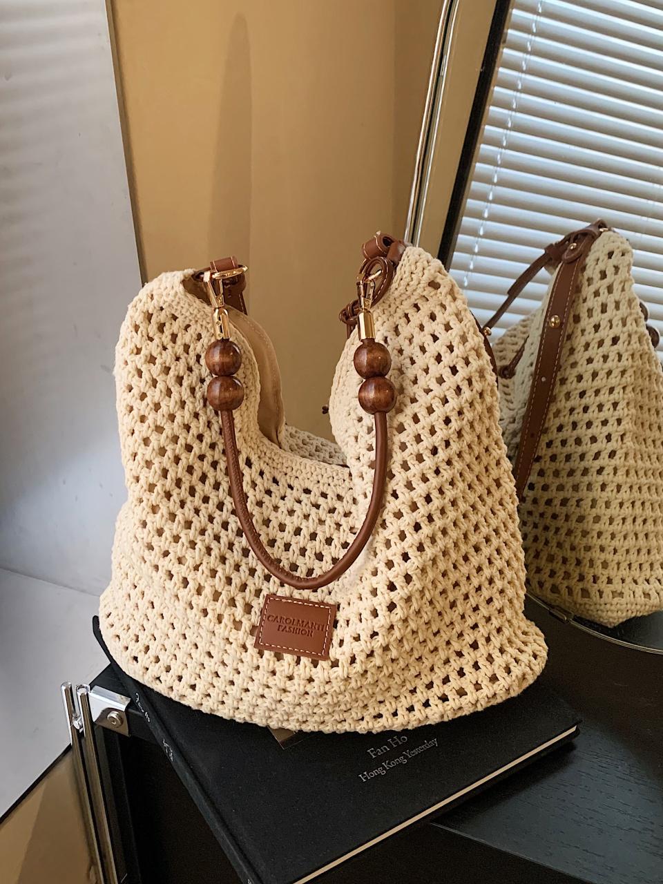 Bolso tejido hueco, verano femenino, nuevo estilo, bolso tejido de paja, bolso de mensajero de un solo hombro de gran capacidad, bolso de playa de vacaciones junto al mar