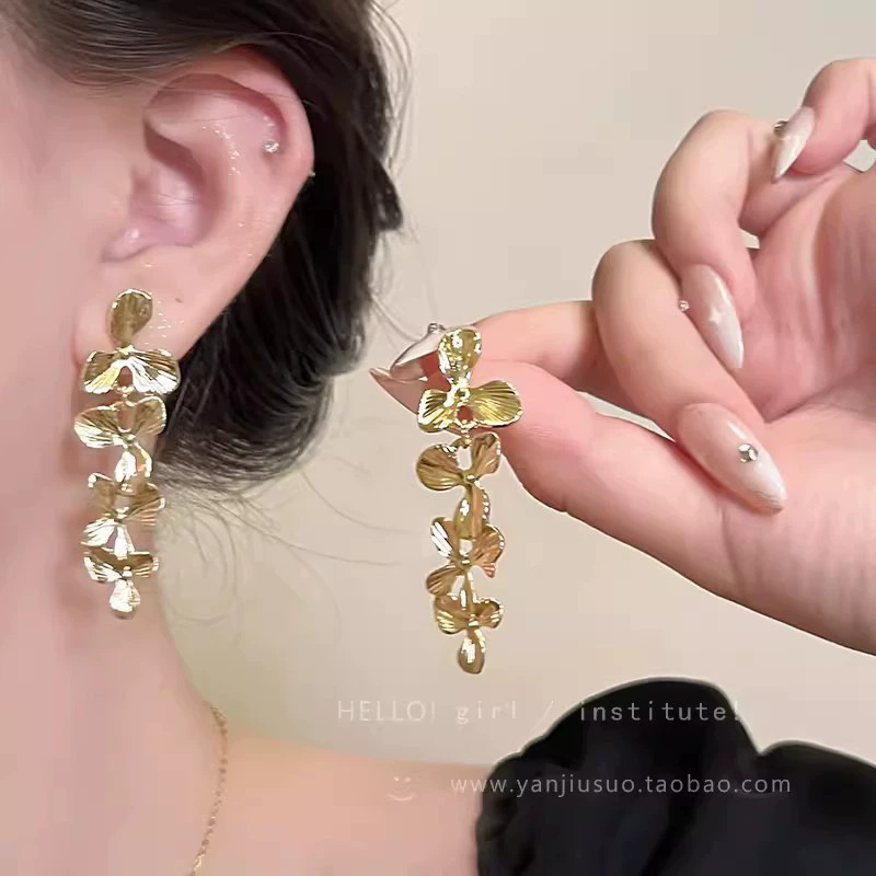 2026 viento falso sensación de atmósfera super inmortal pendientes de flores de malla temperamento suave de chiffon para mujeres pendientes